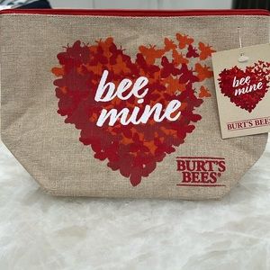 NWT Burts Bees zippered canvas pouch.  Natural color with red zipper.
